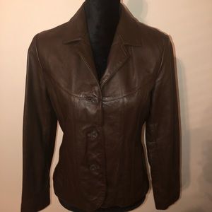 Wilson’s Leather Brown Jacket, no scratches, nor tears.